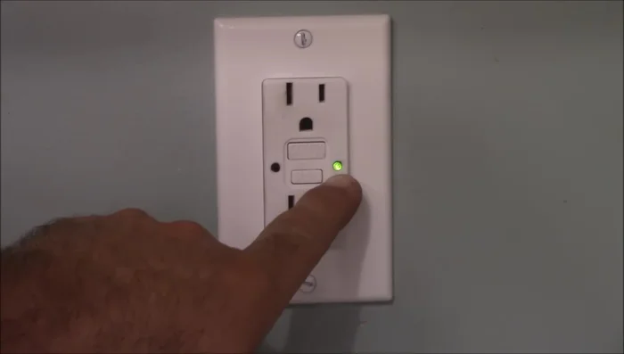 Turn the power back on and test the GFCI outlet using the test and reset buttons.