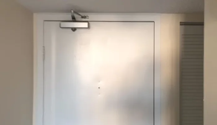 Test and refine: Check the door's closure. If necessary, make further minor adjustments to the hinge loops until the door closes smoothly and without gaps.