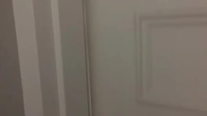 Identify the problem: Observe the gap between the door and the door jamb.