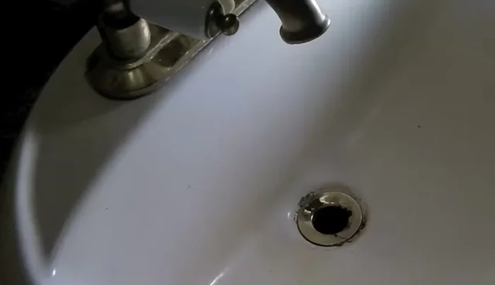 Remove the drain assembly from the sink.
