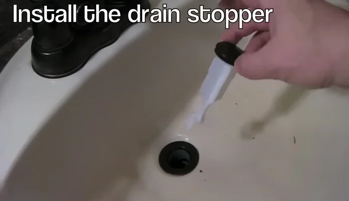 Install the drain plug and lever.