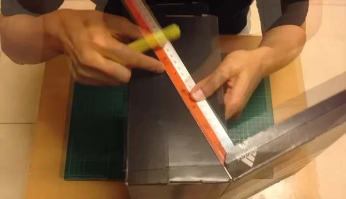 Fold away the inner flaps without cutting them completely to form a wedge shape.