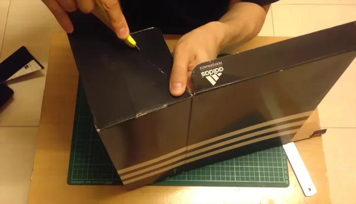 Fold away the inner flaps without cutting them completely to form a wedge shape.