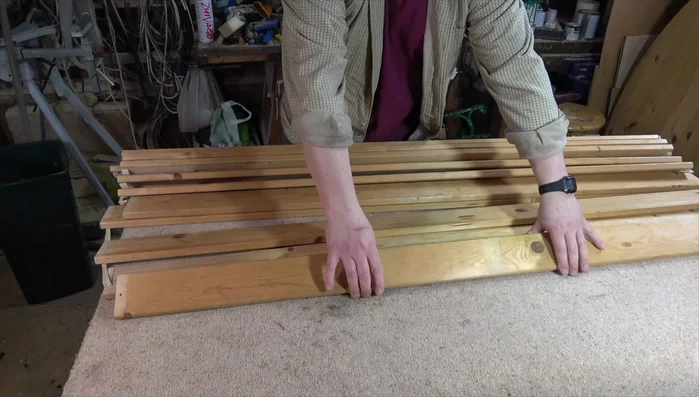 Apply teak oil to the new wood slats for protection and color enhancement