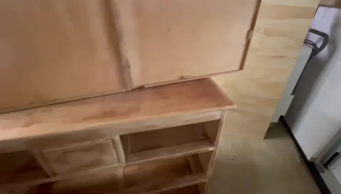 Replace the top molding with 1x4 boards for a cleaner look.