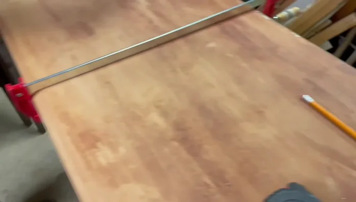 Attach the bottom trim using mitered cuts.