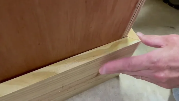 Attach the bottom trim using mitered cuts.