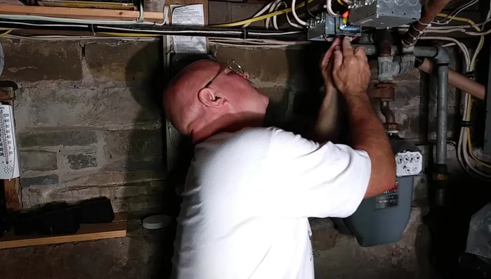 Neatly tuck all wires and connections into the junction box.