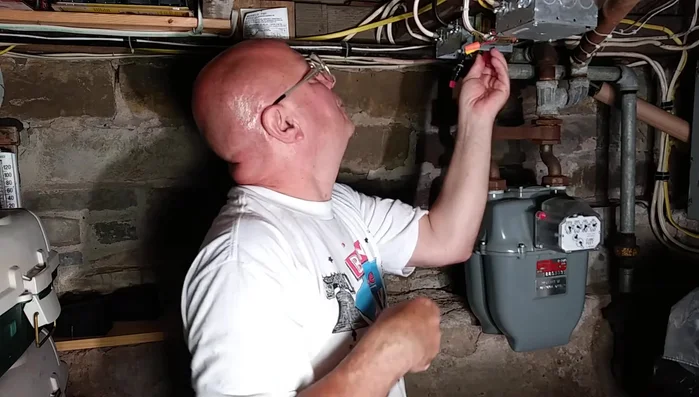 Connect the ground wire (green) to the transformer terminal.