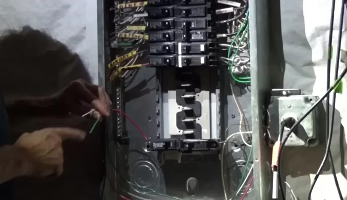 Remove the knockout for the new breaker.