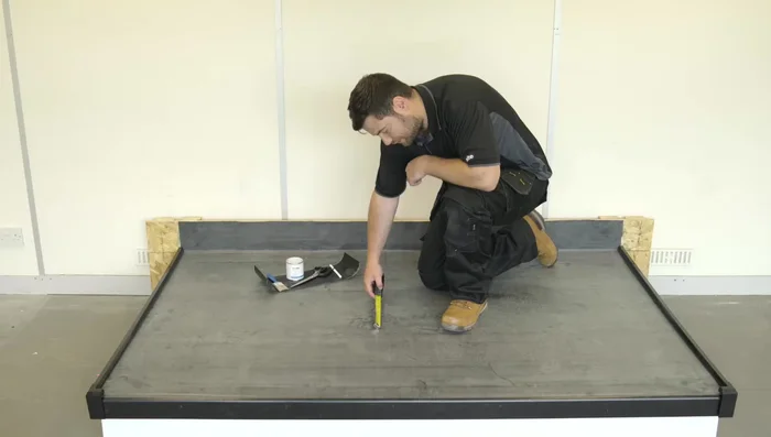 Cut the EPDM patch to the required size (6x9 inches, rounded corners for better adhesion).