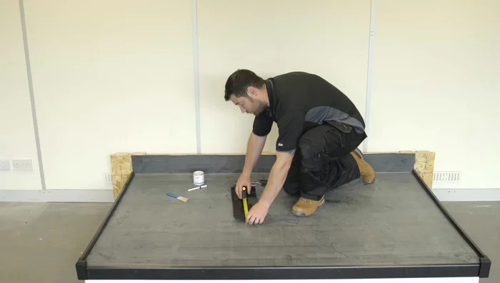 Cut the EPDM patch to the required size (6x9 inches, rounded corners for better adhesion).