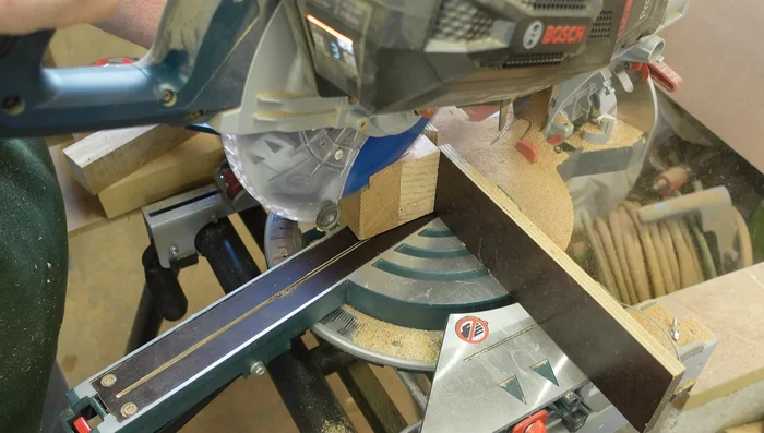 Cut 12° angles for the legs using a chop saw.