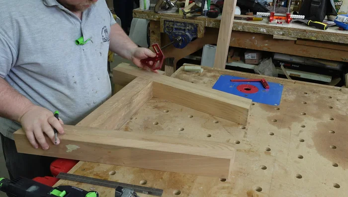Cut half-lap joints on the top stretcher using a simple jig. Plane off burn marks.