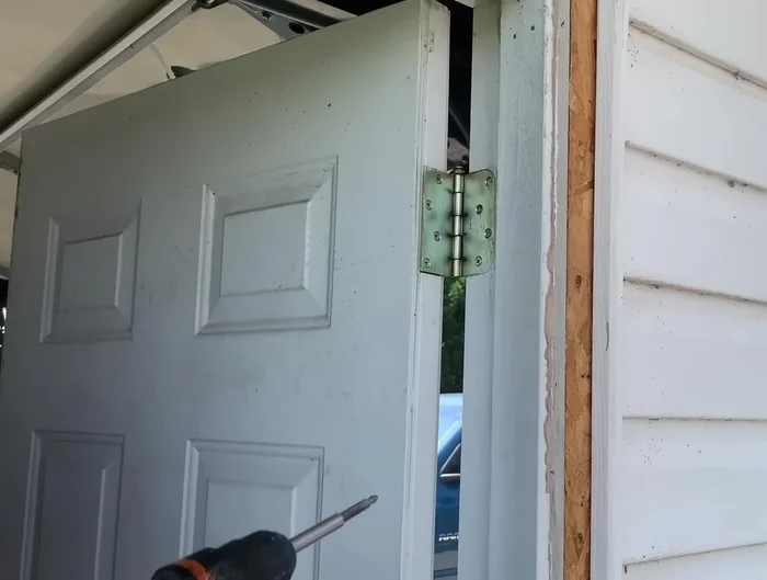 Remove the door from its hinges.