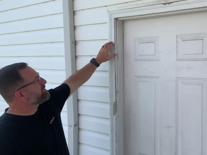 Secure the door to the frame to prevent movement.