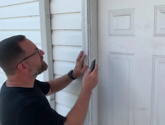 Secure the door to the frame to prevent movement.