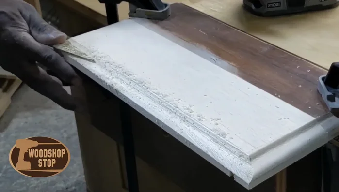 Cut dovetails on the back of the repaired drawer face, ensuring proper fit.