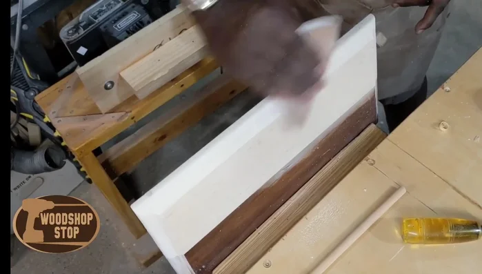 Sand the entire piece to achieve a smooth finish, paying close attention to blending the new wood with the existing piece.