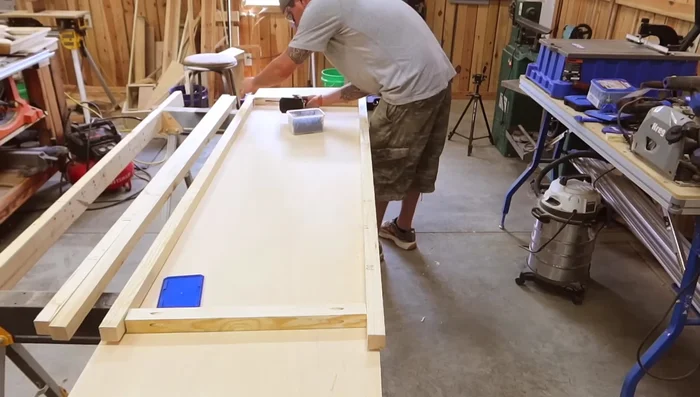 Assemble main frame: Attach side and back walls, using 2 1/2-inch screws.