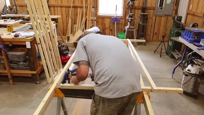 Assemble main frame: Attach side and back walls, using 2 1/2-inch screws.