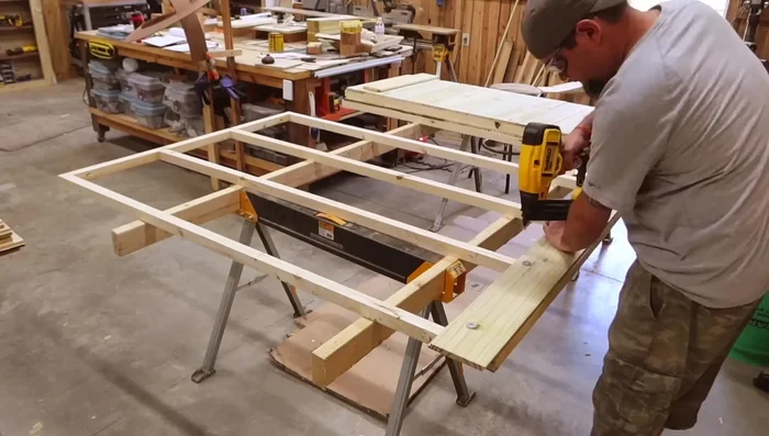 Install shiplap to trusses, leaving a vent on the front.