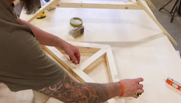 Install false front truss.