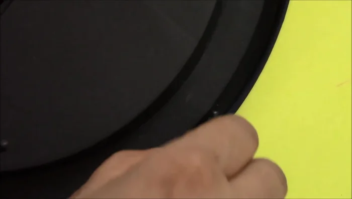 Dismantle the wall clock by unscrewing it. Remove the frame, glass, needles, motor, and cell.