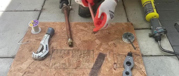 Prepare the new faucet and copper pipe: Clean and ream the copper, apply flux.