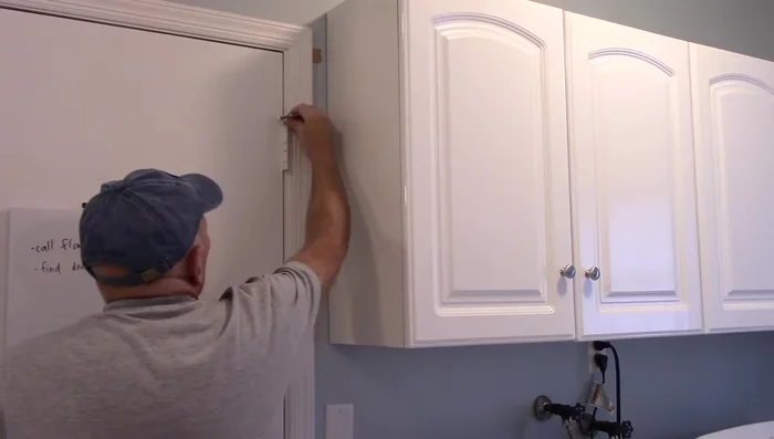 Use the hammer to tap the pin back down until secure.