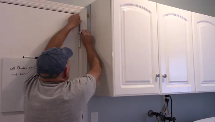 Use the hammer to tap the pin back down until secure.