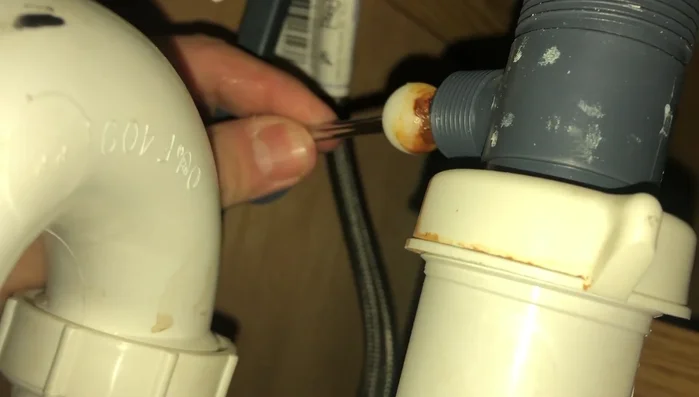 Clean the stopper and drain thoroughly using metal picks to remove debris.