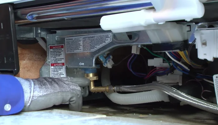 Check the drain hose connection to the drain pump for leaks. Tighten or replace if necessary.