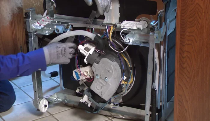 Inspect the bottom components (heating element, sump, diverter motor) for water trails or leaks. Replace any leaking components or seals.