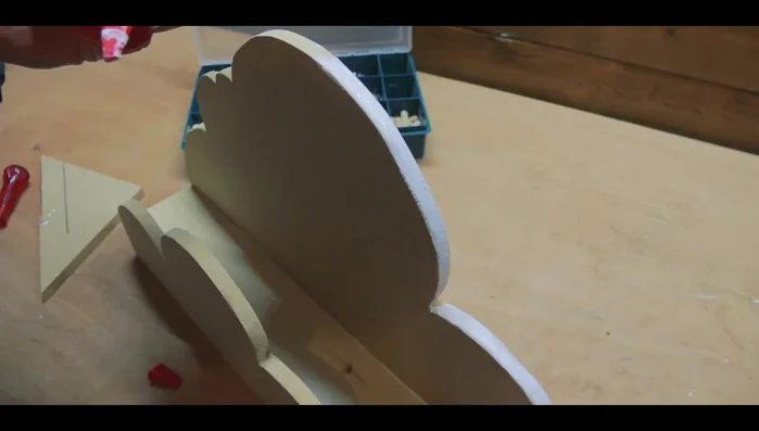 Fill nail holes with a paste of sawdust and wood glue, sand smooth once dry.