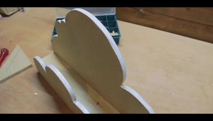 Fill nail holes with a paste of sawdust and wood glue, sand smooth once dry.