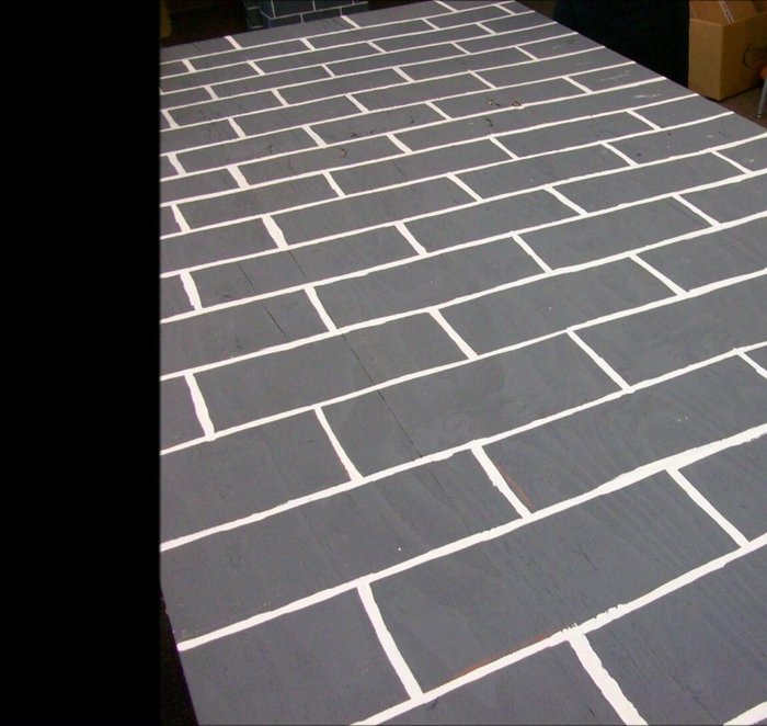 Paint the other wood panel gray, and add dark archway details.