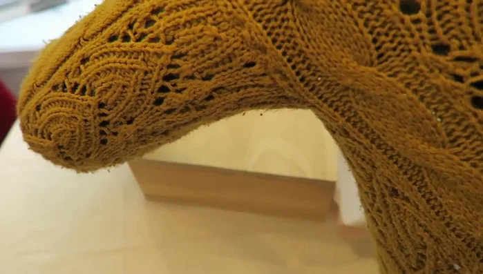 Line the inside of the dispenser with contact paper to protect the paper towels from the wood.