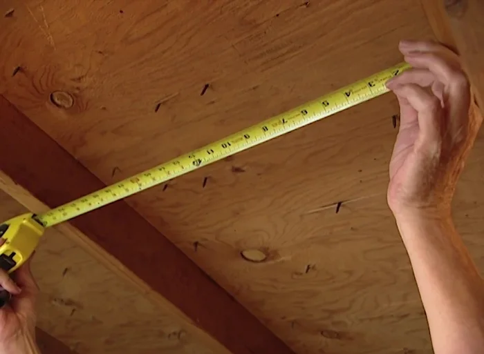 Trace the packing (styrofoam) around the screw hole to mark the cutting area on the roof.
