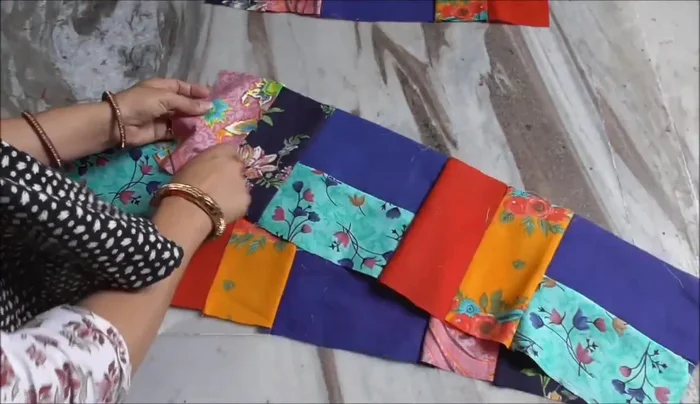 Assemble the Jhaal by joining the strips together in a desired pattern, creating a quilted block.
