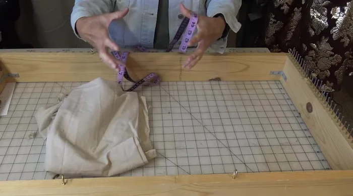 Warp the loom: Measure the distance between loom nails, double it, and multiply by the number of nails to determine the total warp length. Join strips end to end to create one long warp length. Wind the warp onto the loom.