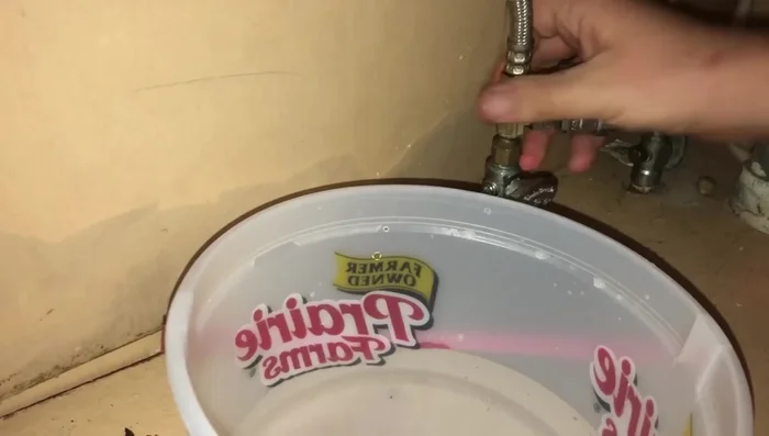 Reattach the hose, hand-tightening it first to ensure it screws on smoothly, then using the wrench to tighten it snugly. Avoid over-tightening.