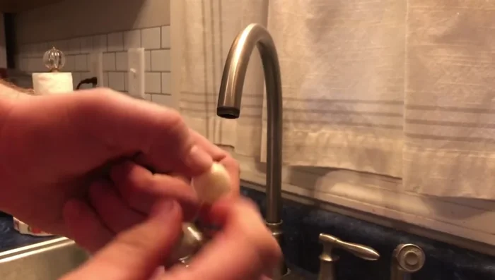 If both hot and cold water have low pressure, check the aerator for debris as described in Step 2.