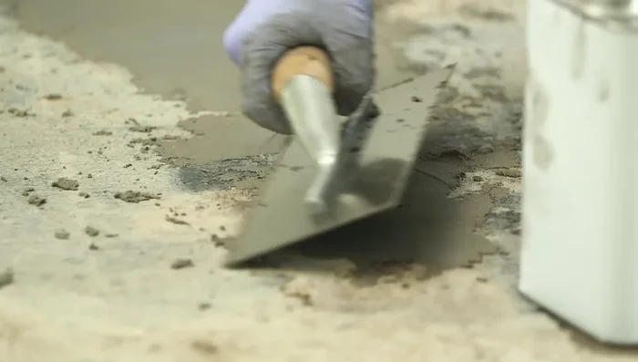 Feather the edges: Concrex is easily feathered to the edge of the hole, eliminating the need for cutting out concrete.