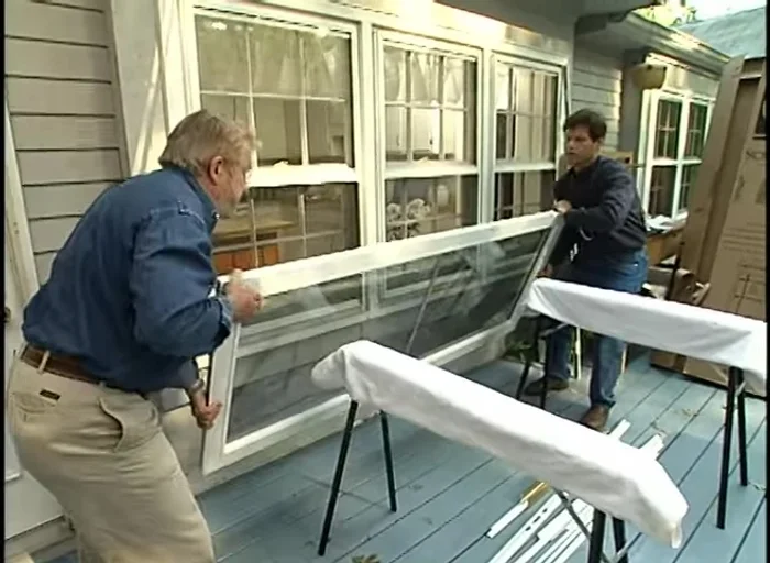 Prepare the new door: Remove shipping tabs and separate hardware using a muffin tin for organization.