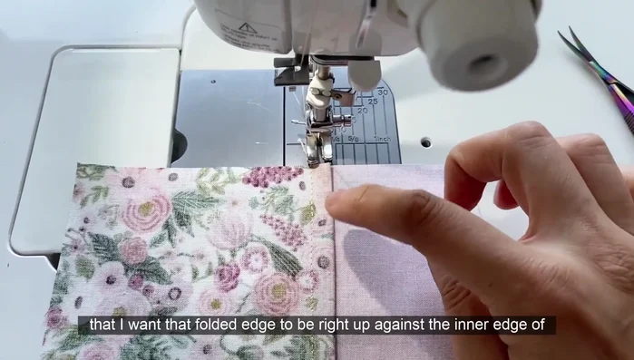 Edge stitch along the folded edge to secure the seam.