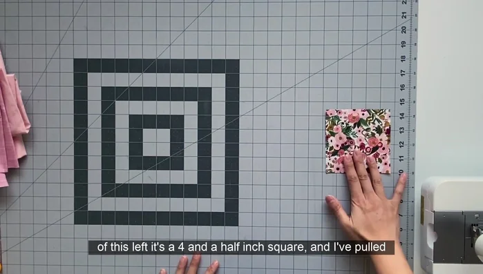 Cut fabric strips ranging from 3 to 3.5 inches wide.