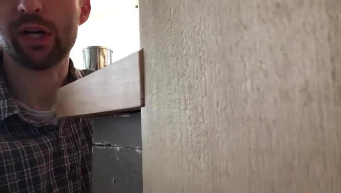 Attach the smaller beams to the main faux beam, ensuring they are flush against the top surface.