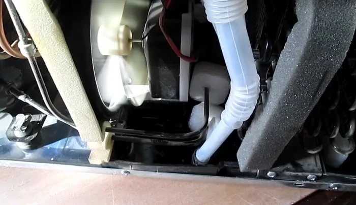 Test the drain: Use a turkey baster to squirt water down the drain line to check if it drains properly.