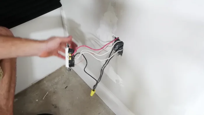 Restore power and test the new light and outlet.